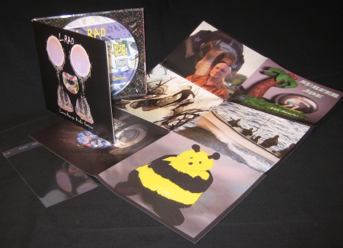 L-RAD-cd, open, with poster L-RAD-cd, open, with poster